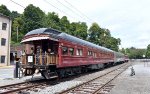 The Black Diamond and some other private cars rest just north of the Jim Thorpe Station. The president of the RBM&N, Andy Mueller, was sitting on the deck of the RBM&N at the time and I complimented him on not only the operation of the 2102 excursion, but